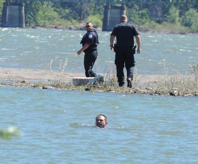 Suspect pulled from river after watery elude