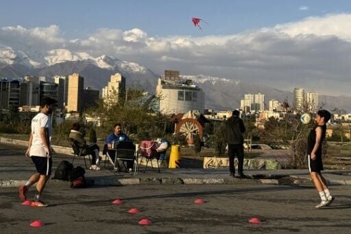 Some young residents of Tehran exercised, flew kites and held picnics in a park on Sunday despite the threats
