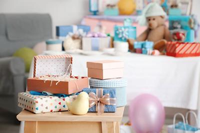 Gifts for baby shower on stool indoors