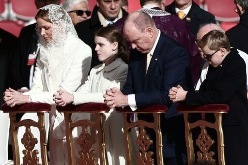 Princess Charlene of Monaco, Prince's Albert II of Monaco and their twin children attended the mass