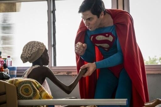 Leonardo Muylaert, known as the Brazilian Superman, greets a patient