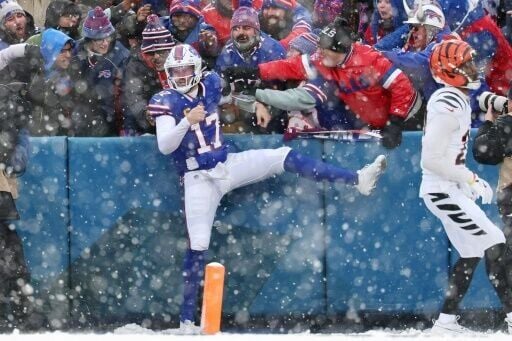 Josh Allen celebrates the longest rushing touchdown of his career in the Buffalo Bills win over the Cincinnati Bengals