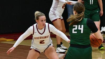 Bryce Newby (2) on defense against Estacada on Jan. 29.