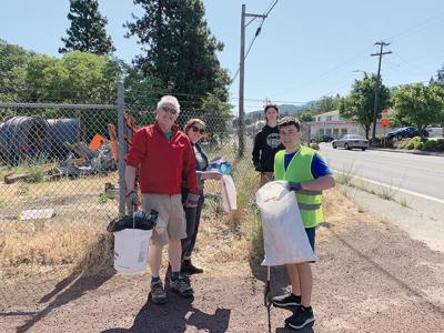 Volunteers pick up litter along Cascade Ave in Hood River in 2023, an event hosted by the city. Photo from solve.org.