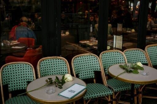 White roses at La Bonne Biere, one of the targets of the attacks