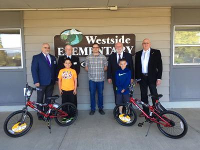 Masons give bikes at Westside