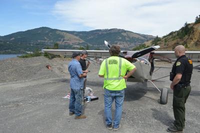 WILD plane lands at gravel pit.JPG