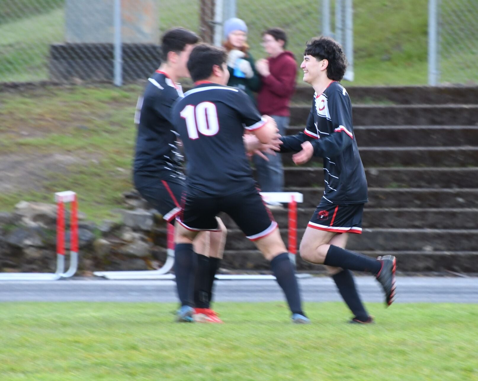 CHS GOAL 2-Armando Celaya is congratulated by teamates for his goal #10 and #8DSC_9077.JPG