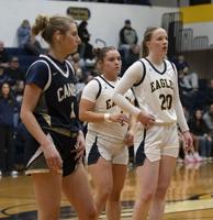Road wins push Eagle girls to .500 in conference