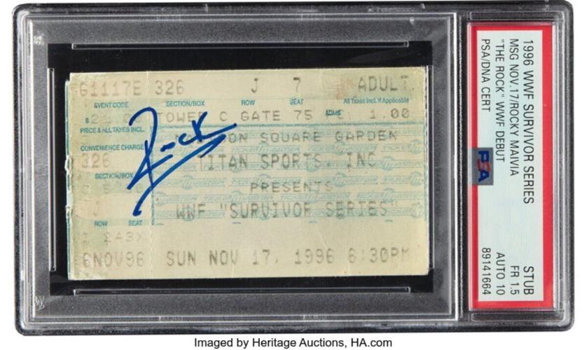 A rare signed ticket to The Rock’s debut professional wrestling match sells for £8,200.