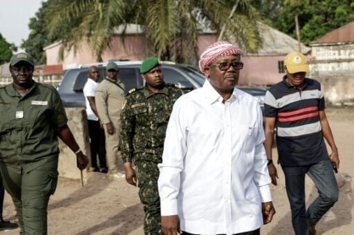 Umaro Sissoco Embalo, pictured at a polling station on November 23, went to Senegal after the military took control of Guinea-Bissau