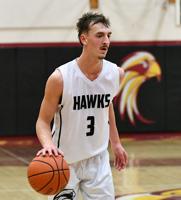 The Dalles boys split games to finish season