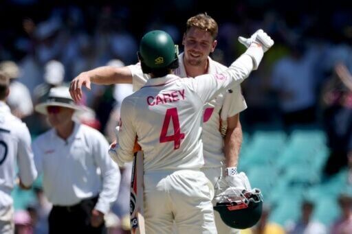 Australia's Cameron Green and Alex Carey celebrate winning the final Ashes Test against England in Sydney