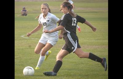 Late goal salvages draw for TD