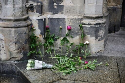 Flowers were placed at a church close to where the man drove the car into a crowd