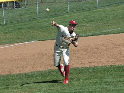The Dalles third baseman Trey Hodges (4) makes a play to first base.Mike Weber photo