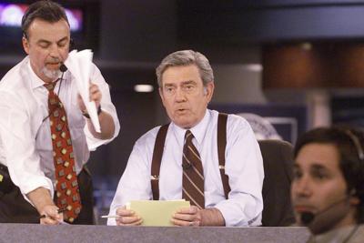 CBS News anchor Dan Rather rehearses for election night coverage on Nov. 3, 2000, in New York.