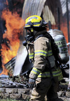 Fire guts garage, vehicles