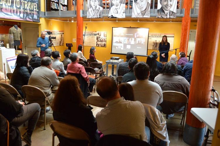 Anna Goodwin, executive director, the History Museum of Hood River County, addresses invited guests at the Hood River Nisei WWII Veterans exhibit reception Dec. 3. Visitors were invited to see the current exhibit, “A Long Road to Travel,” as well as lea...