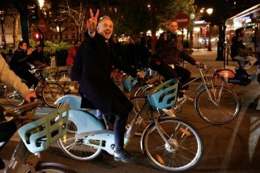 Socialist candidate Emmanuel Gregoire hopped on one of Paris's iconic rental bikes to head to city hall