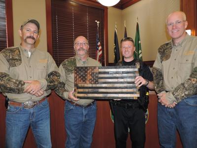 Staves for the brave: Veteran supporters honored with special wooden U.S. flag