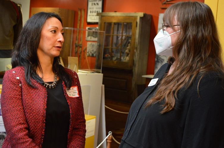 Jessica Asai, comment moderator, speaks with Elissa Dingus of JAMO at the Dec. 3 Hood River Nisei WWII Veterans exhibit reception held at the History Museum of Hood River County. Visitors were invited to see the current exhibit, “A Long Road to Travel,”...