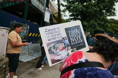 People gather in Corona, a neighborhood in the Queens borough of New York City, to denounce ICE arrests on Aug. 10, 2026.