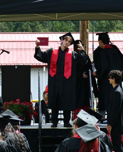 Kaleb Norton receives his diploma from Columbia High School in White Salmon on Saturday, June 6.