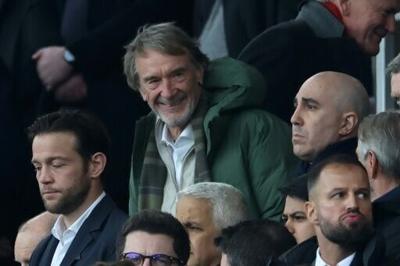 Manchester United's co-owner Jim Ratcliffe (C)
