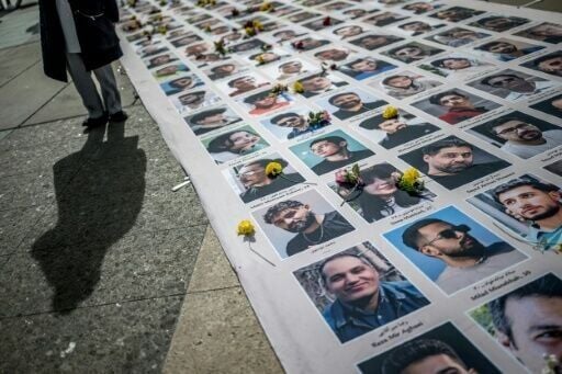 Demonstrators displayed portraits of Iranians killed during recent protests on the sideline of the 61st session of the UN Human Rights Council in Geneva