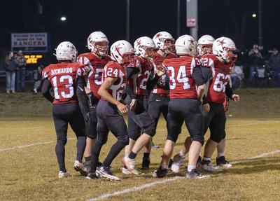 The Dufur offense breaks the huddle against Perrydale in the 2025 1A 8-man quarterfinals.  Zach Thummel photo