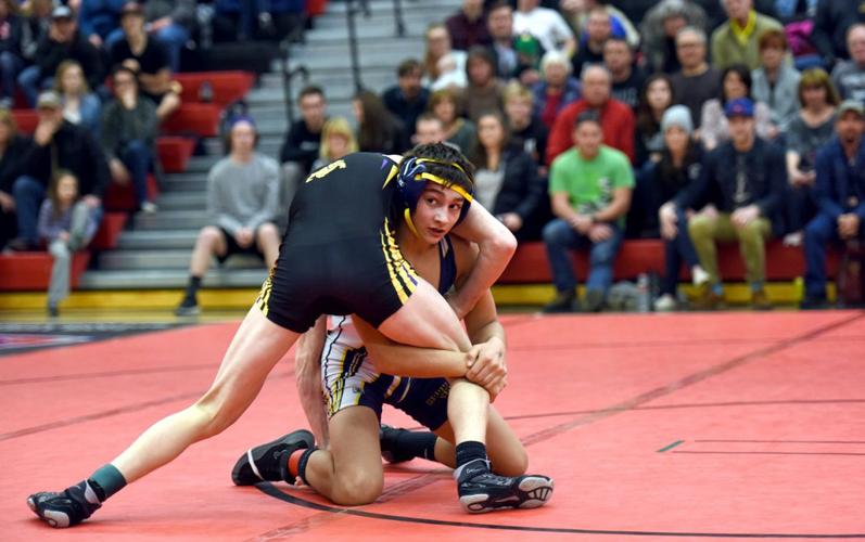 Eagles wrestling fourth at districts, sends five to state championships