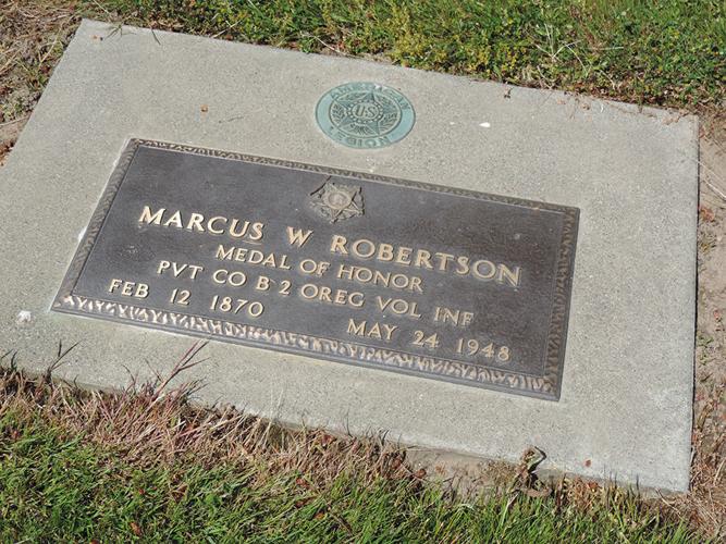 The men who care for scenic Pine Grove Cemetery give extra attention at Memorial Day