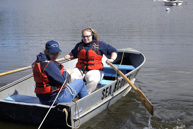 Rachael and Ashten set off to tie a line (rope) to the buoy