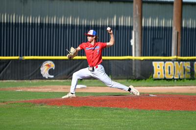 Landen Pratt delivers a pitch earlier this summer.