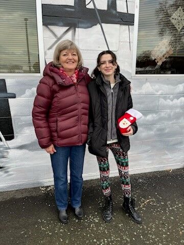 Long-time Wasco County match MaryEllen and Laurel have attended 12 Christmas Breakfasts and enjoy coming every year. Photo courtesy The Next Door