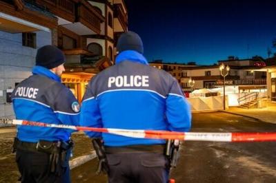 Police controlled access to the street where a fire ripped through a crowded bar during New Year celebrations in Crans-Montana