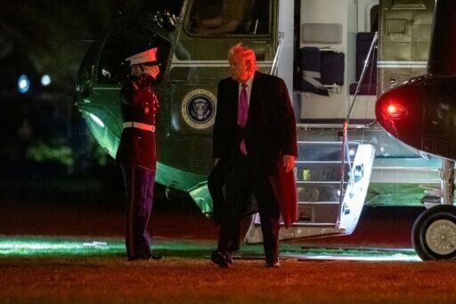 US President Donald Trump steps off Marine One on the South Lawn upon returning to the White House from a weekend at his Mar-a-Lago resort