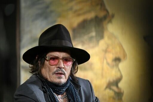 US actor Johnny Depp told AFP in an interview that his life with former French partner Vanessa Paradis and their two children was 'bliss'