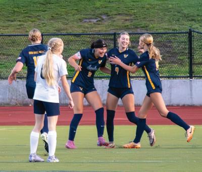 The Hood River Valley girls soccer team celebrates after a goal earlier this season  Zach Thummel photo