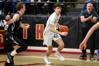 Calder Morrison attacks the hoop last year   Renee Mendoza photo