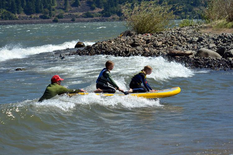 Kids play, and learn, with water