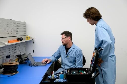 Team members consult during a visit to DroneShield in Sydney on February 9, 2026