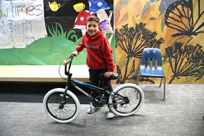 Kids win refurbished bikes