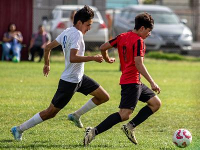 Ivan Sanatana (17) dribbles the ball in a game last year.