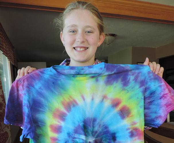 Wade Pickering, 14, and family learn together and look ahead to the County Fair