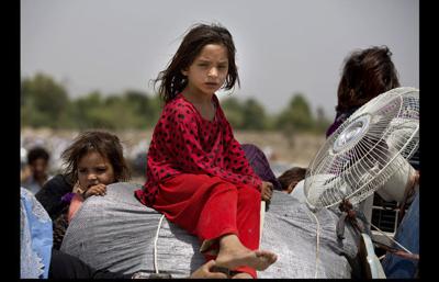 Thousands flee tribal home