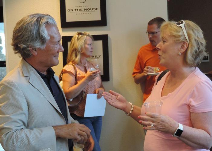 Crowd welcomes Hampton Inns at grand opening