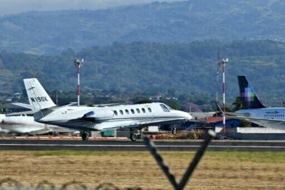 A US Drug Enforcement Administration plane takes off during the extradition operation to transport Costa Rica's former security minister Celso Gamboa, who is accused of drug trafficking