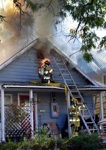 Heights house fire roars up Friday